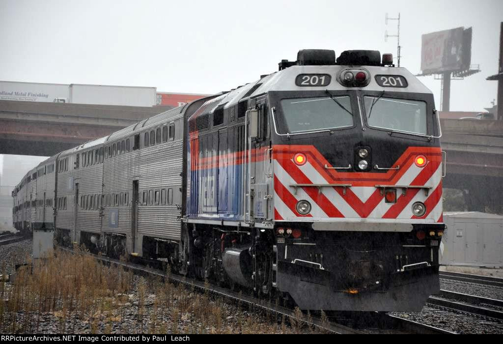 Inbound commuter shoves east out of the station